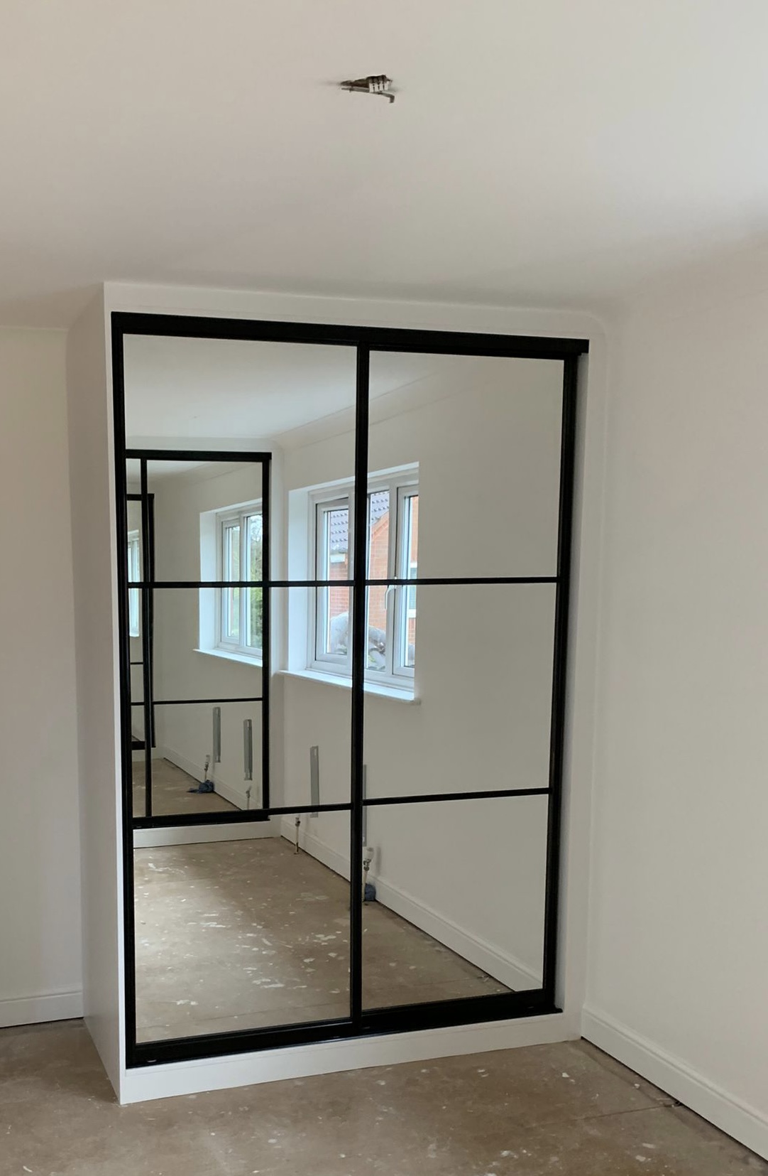 Made to measure sliding wardrobe kit 4 mirror doors, black frames
